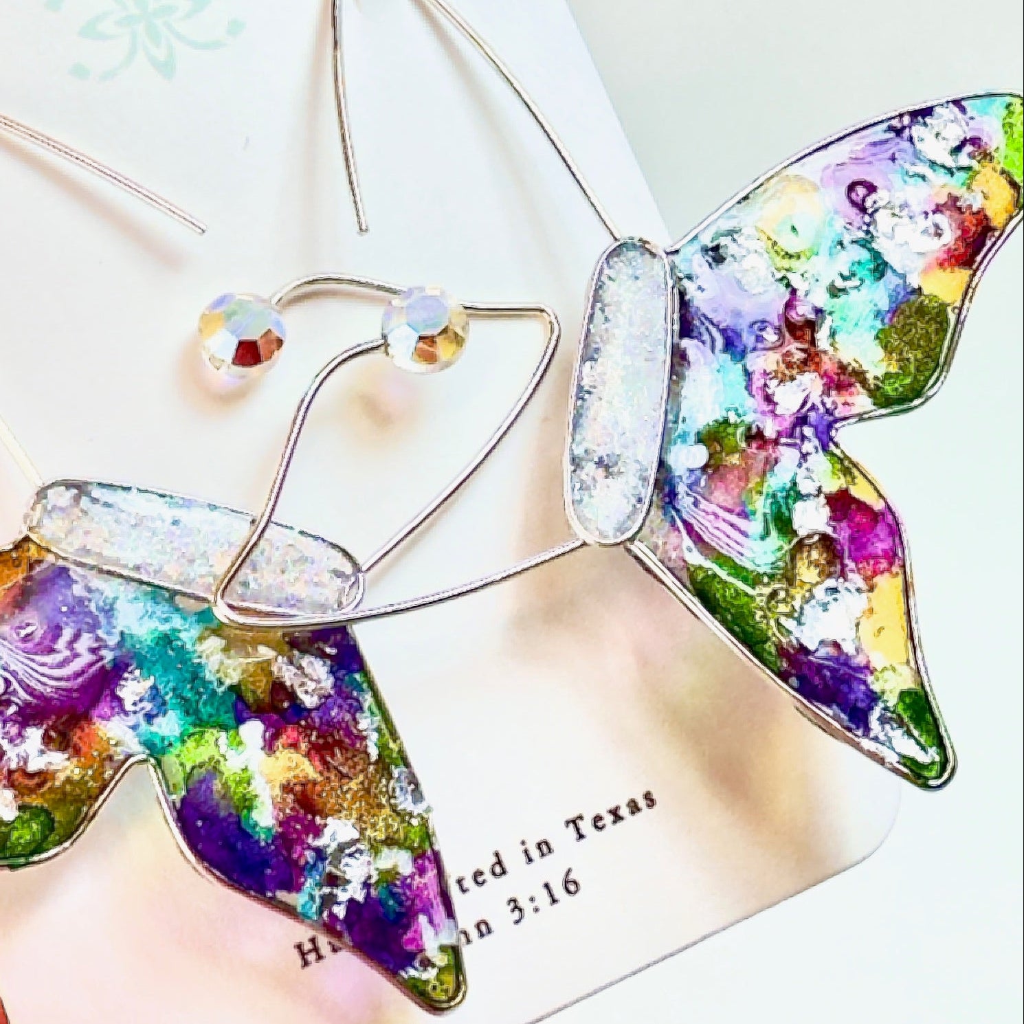 Metallic Spatter Butterfly Hoop Earrings in Silver on white card