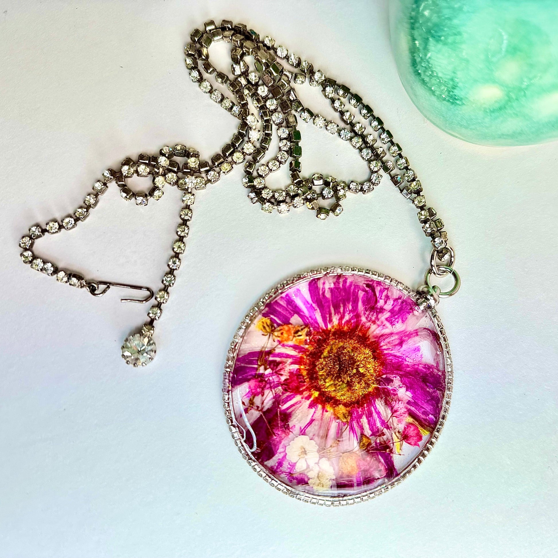 Oversized statement necklace with vintage crystals and pressed flowers. Made in Conroe Texas by Chestnut Chic Studio.