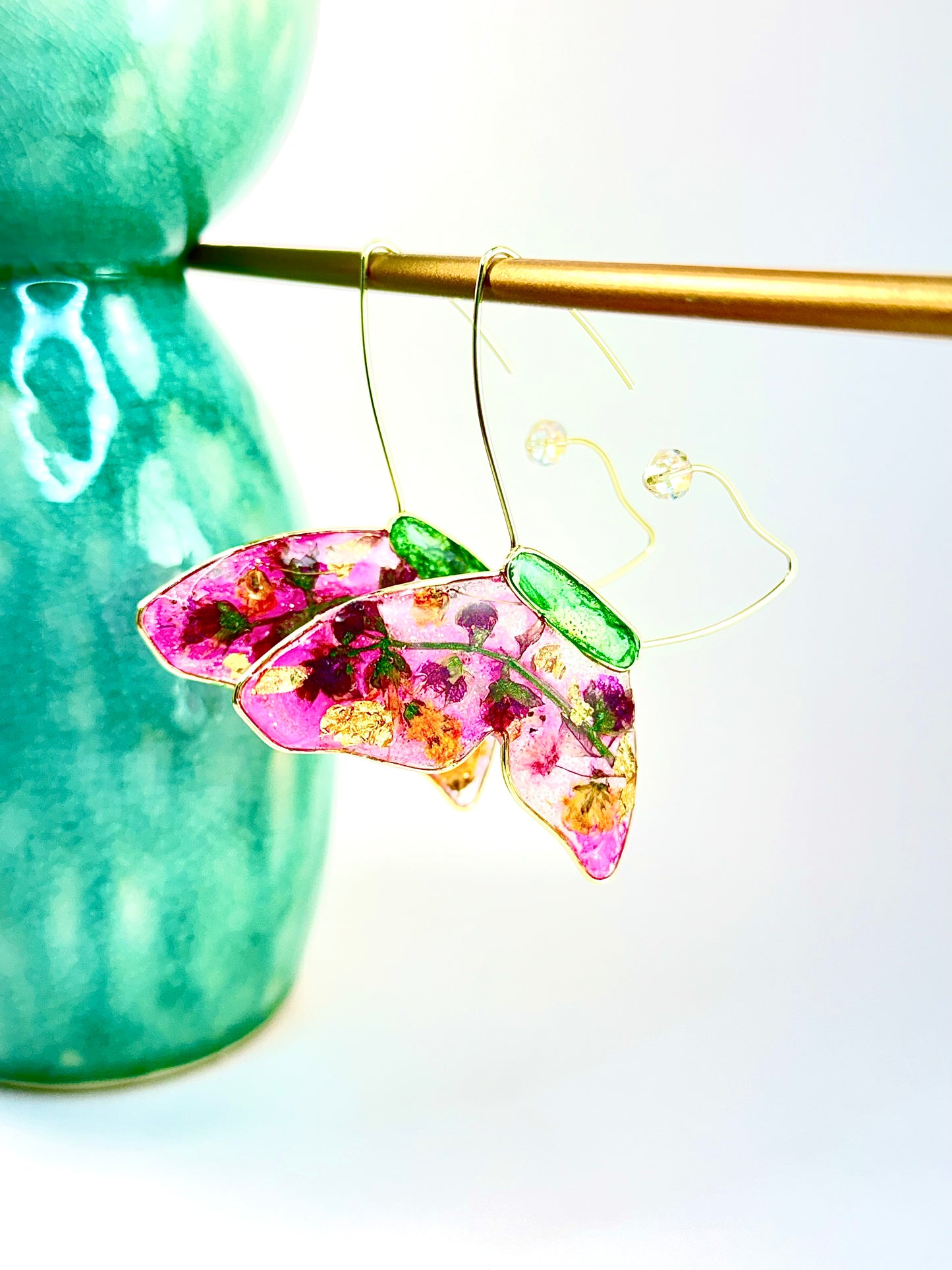 Floating Butterfly hoop earrings. Hand crafted artisan butterfly earrings with pressed botanicals. Chestnut Chic Studio